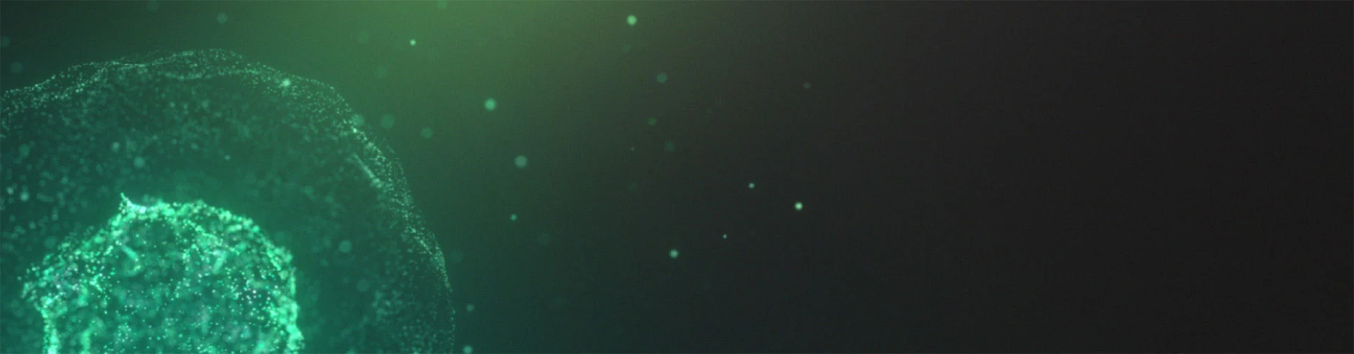 Green particles on a dark background