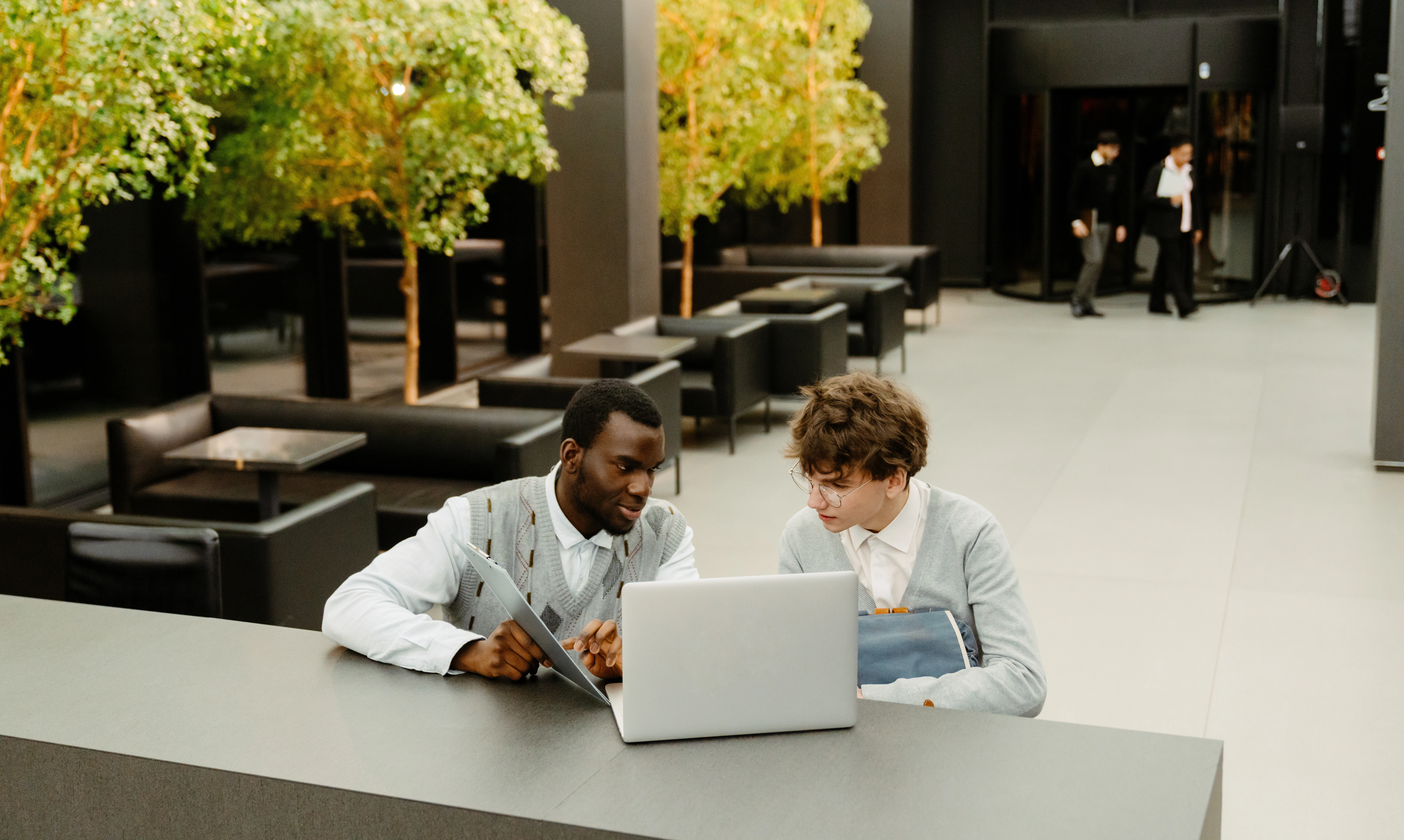 young talent talking to supervisor